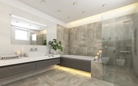 Badezimmer mit grauen Fliesen